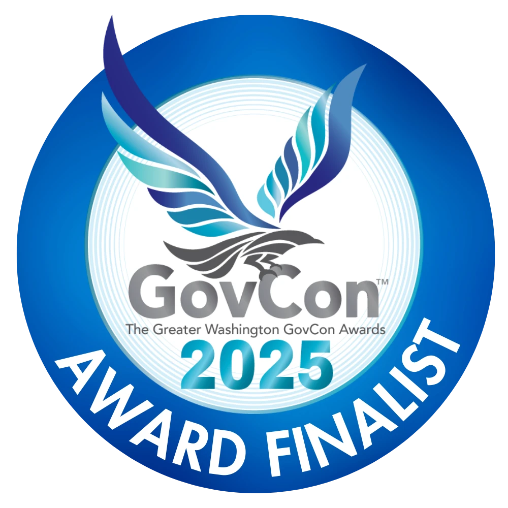 GovCon 2025 Award Finalist badge featuring a stylized eagle design in shades of blue and gray. The text "GovCon" and "Award Finalist" are prominently displayed, along with "The Greater Washington GovCon Awards 2025". Nakupuna has been selected as a finalist.