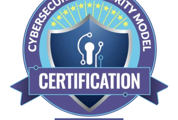 Cybersecurity Maturity Model Certification (CMMC) Level 2 logo. Shield with circuit design, surrounded by stars and text, indicating Nakupuna's commitment to government contracting partnerships and mission-focused government services. This image is featured on the Nakupuna Companies website.