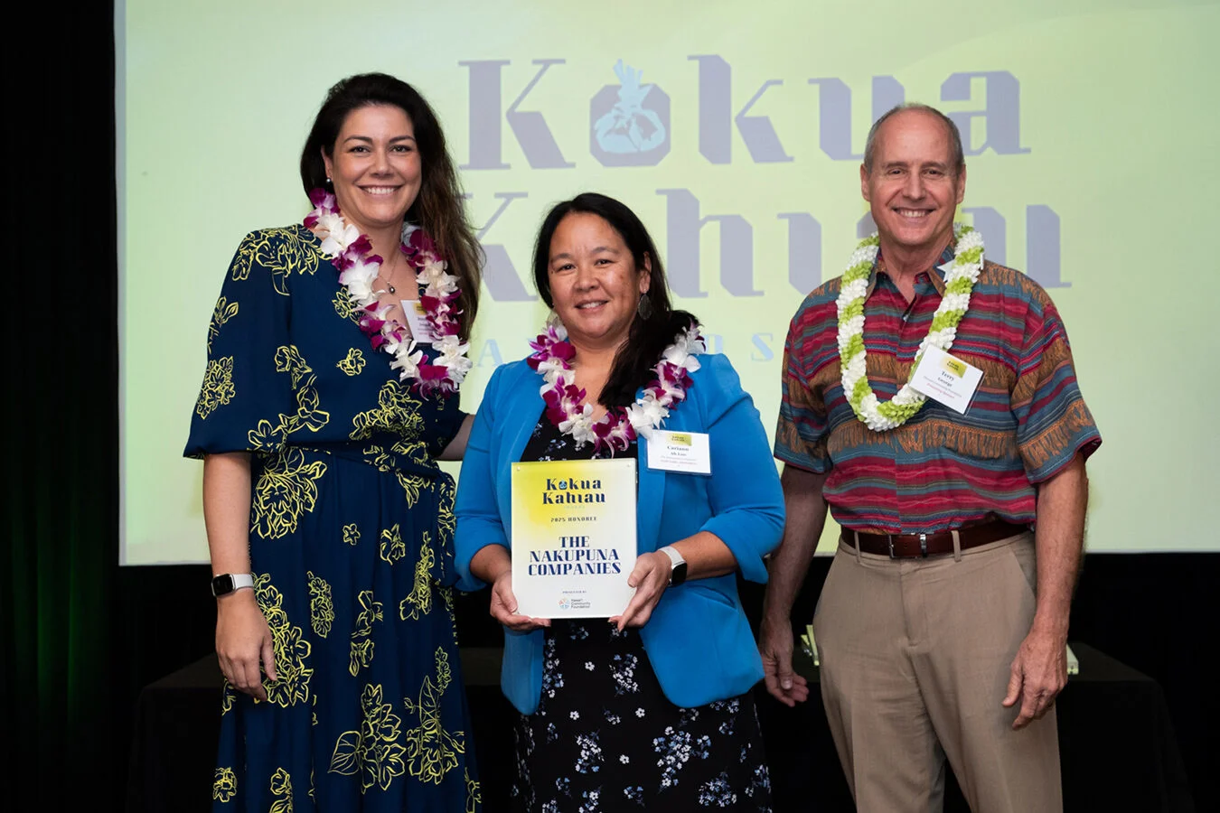 Nakupuna team - Jeannin Jeremiah and Cariann Ah Loo with the Pacific Business News' Kōkua Kahiau Award. This image is featured on the Nakupuna Companies website.
