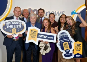 Nakupuna leadership andn employees celebrate being named a 2026 Top Workplace, holding signs that read "We Made The List!" and "Top Workplaces 2026". This image is featured on the Nakupuna Companies website.